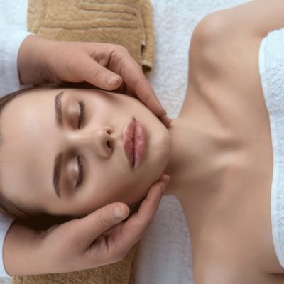 Woman receiving neck massage