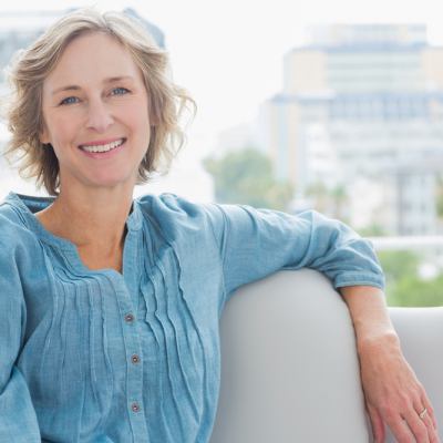 Middle-aged woman smiling brightly