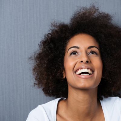 Woman looking up and smiling