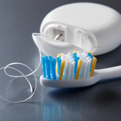 Floss and toothbrush