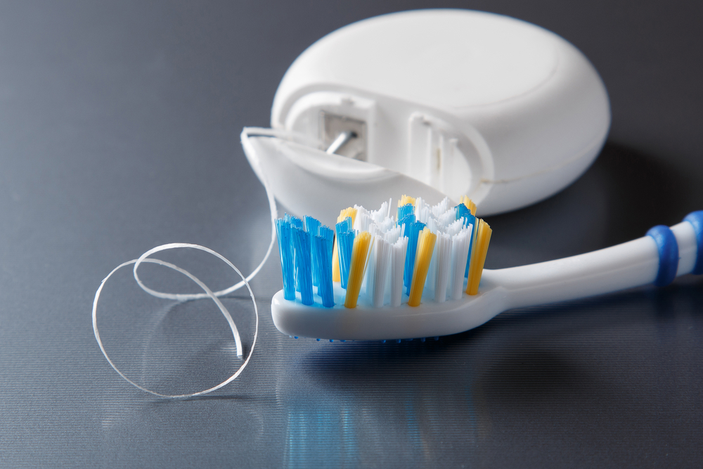 Floss and toothbrush