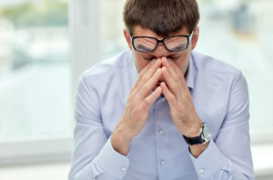 Frustrated main holding bridge of nose