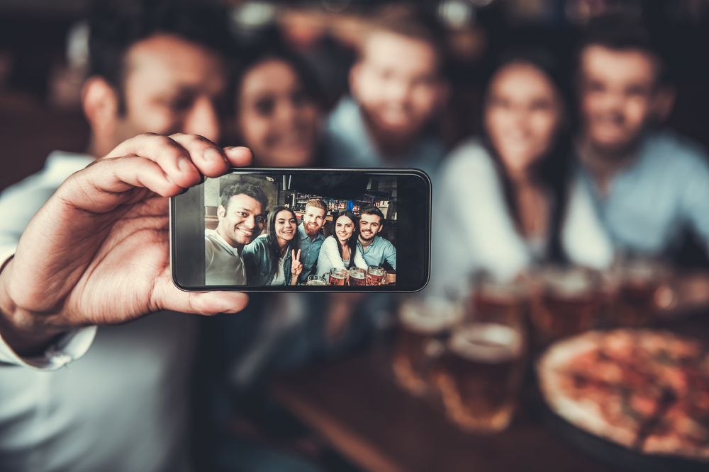 Friends taking a selfie at the pub