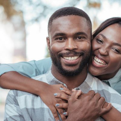 Couple smiling brightly