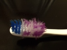 Old frayed toothbrush